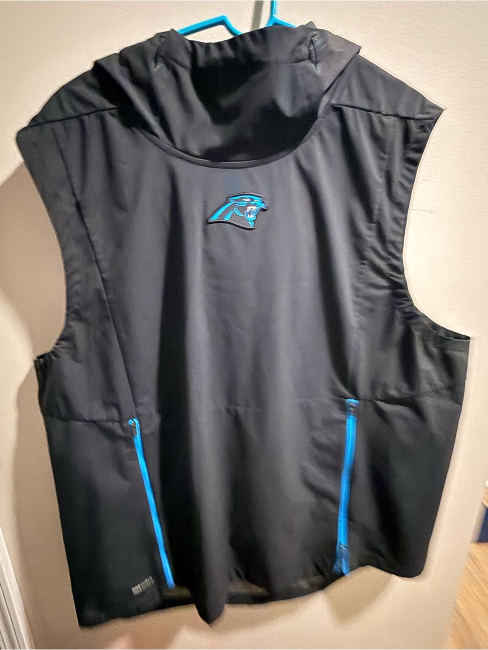 Nike Carolina Panthers Black Hooded Vest with Blue Accents